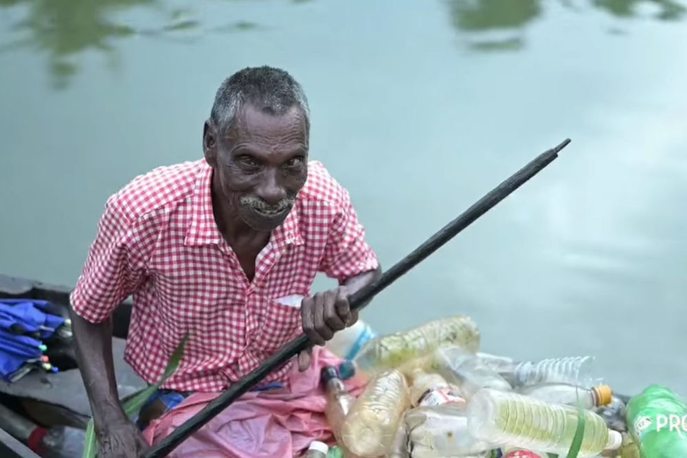 photo-of-paralyzed-man-cleaning-plastic-from-india-river-goes-viral-and-hes-showered-with-gifts-to-better-his-life.jpg